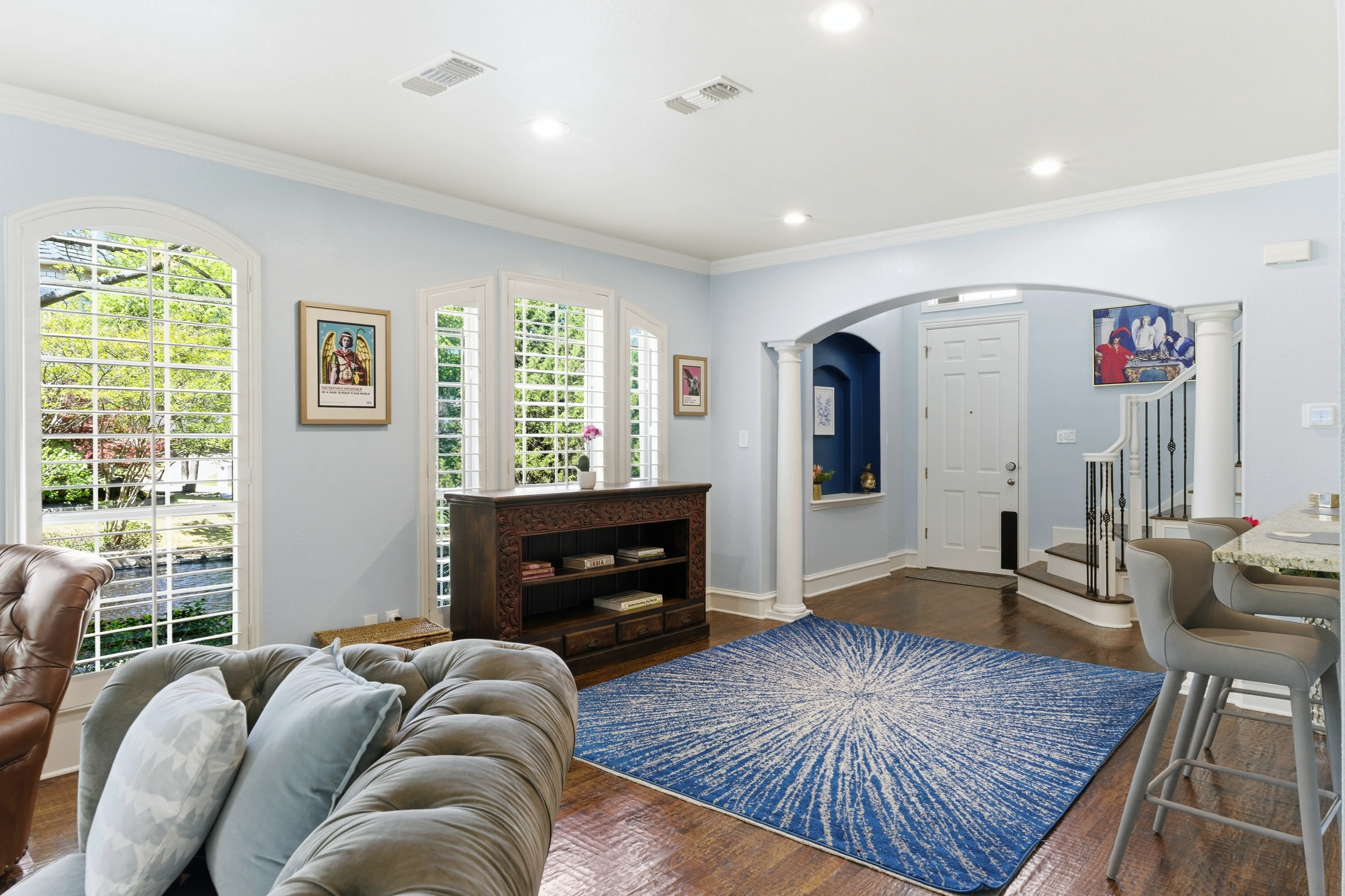 Living room from entrance with bar stools